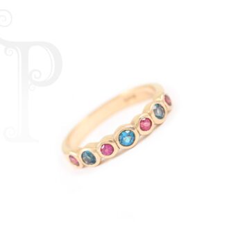 9k Rose Gold Rhodalite and London Blue Topaz Tube Set Eternity Ring